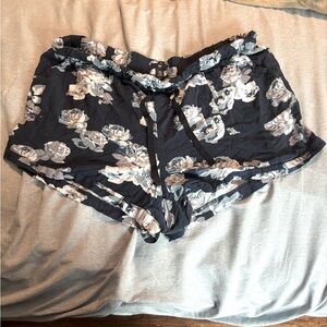 Navy shorts w/blue flowers